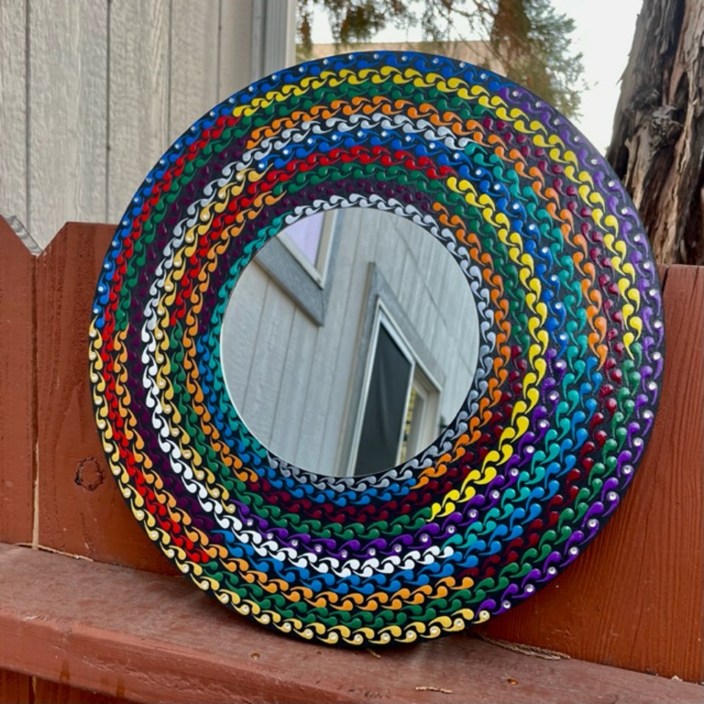 Wall Mirror 13in Diameter with Braided Rainbow Design